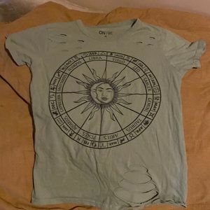 Zodiac tee w/ rips on shoulders & at bottom hem. Size medium. Good condition.